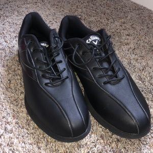Black golf shoes